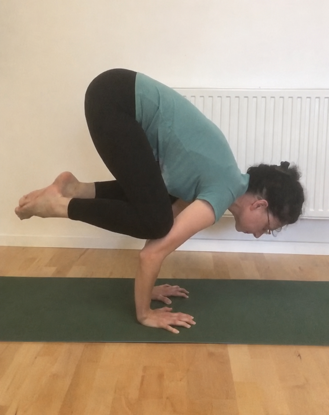 Judit crow pose
